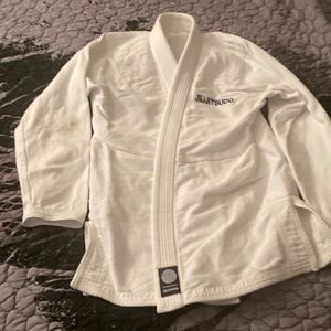 Lightly used, stained sleeve, ju jitsu gi small.
